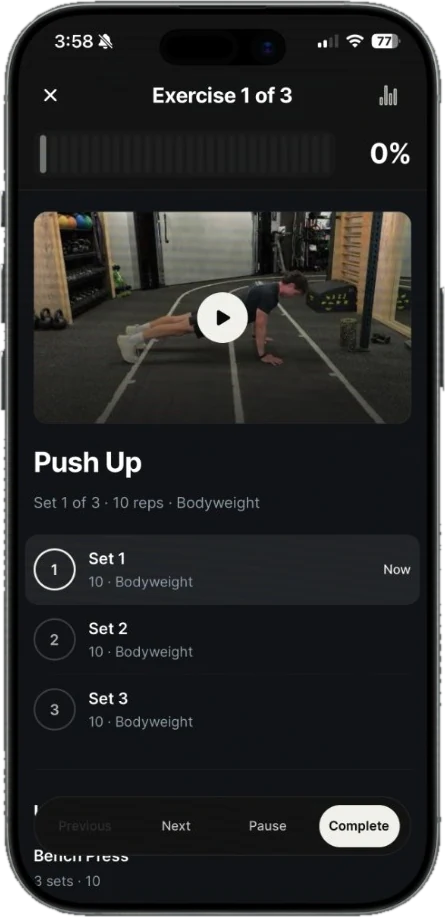 Adapt app exercise screen with a push up video and three sets to tick off